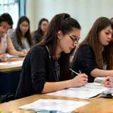 Students taking IELTS and TOEFL mock exam at LinguaBridge UK